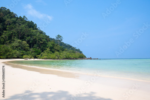 Fototapeta Naklejka Na Ścianę i Meble -  View of Mu Ko Surin Nation Park,  Beautiful white sand beach, and popular coral reef for snorkeling in Andaman, Thailand.