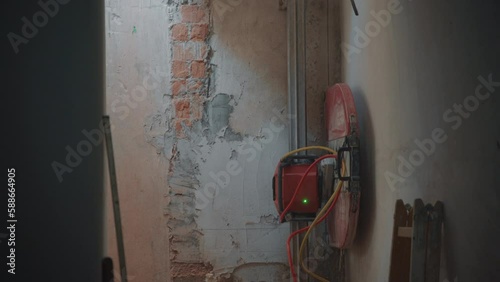 4K video of cutting a panel concrete wall with core saw