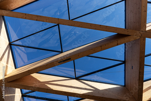 Modern roof construction made of wood and glass