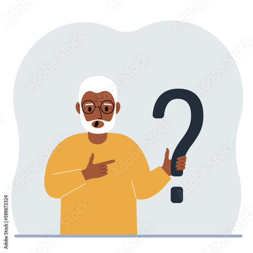 A man is holding a question mark symbol. Ask questions and look for answers. FAQ or frequently asked questions concept, online support center.