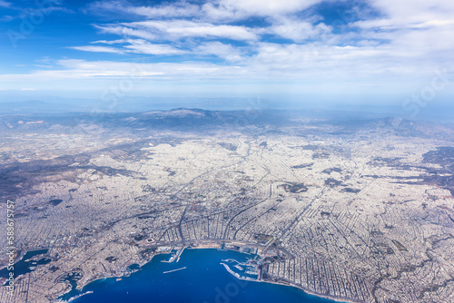 High aerial view of the city of Athens, Greece, with the coastal districts up until the Acropolis and beyond