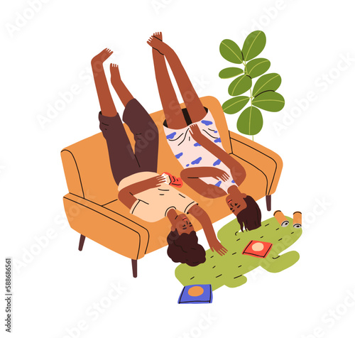 Girls friends relaxing, talking, eating food, lying on sofa. Girlfriends rest...