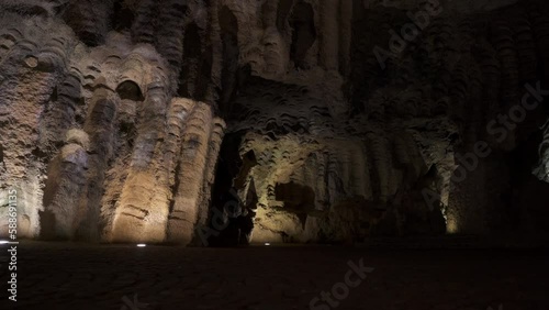 Illuminated Hercules cave at night in Tangier, Morocco