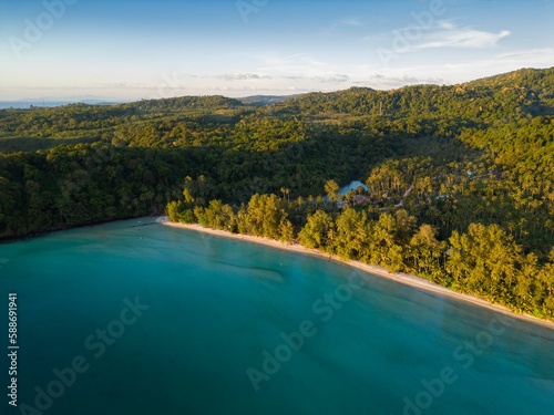 Aerial shot of the Ao Jak beach on Koh Kood island in Thailand surrounded by the blue sea