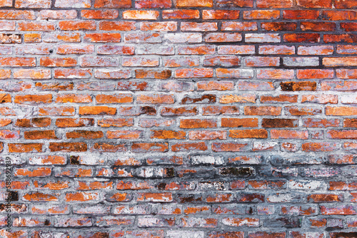 Worn brick wall pattern as background