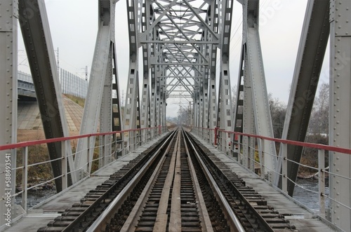 Fototapeta Naklejka Na Ścianę i Meble -   old steel railway on the bridge in the country