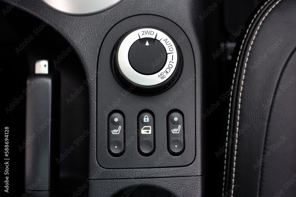 Control panel for off-road functions. SUV driving mode switch. Management of interlocks, drive and low gear. Car drive mode selector. Suspension and wheel drive control panel. Control panel for off-road functions. SUV driving mode switch. Management of interlocks, drive and low gear. Car drive mode selector. Suspension and wheel drive control panel.