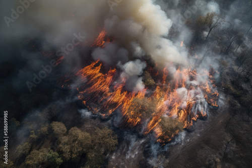 Aerial photography of a massive forest fire. Drone top view of wildfire with smoke and burning trees from the height of a bird flight. Ecological catastrophe. 6K high resolution image. Generative AI