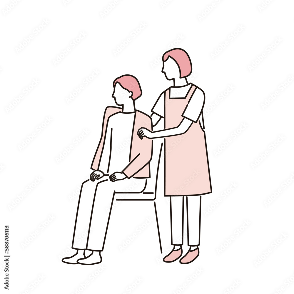 着替えをする女性と介助する介護福祉士 着替えをする女性と介助する介護福祉士