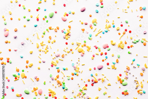Easter background. Sprinkling with sugar balls and eggs, decoration for cake and baked goods.