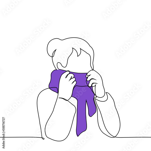 woman adjusting her scarf - one line drawing vector. concept to dress warmly, cold snap or autumn winter season