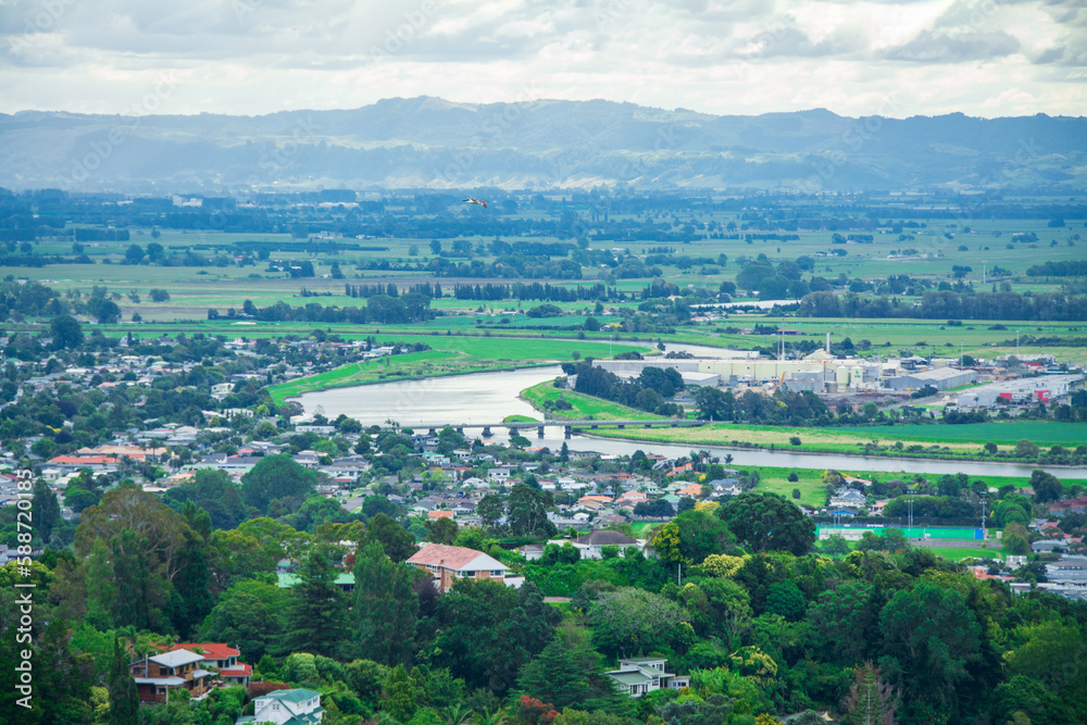 Stunning aerial view over town of Whakatane. The heart of the Eastern Bay of Plenty, New Zealand, it's nested between Whakatane River and bush-clad cliffs. Kohi Point Lookout, Whakatane, New Zealand