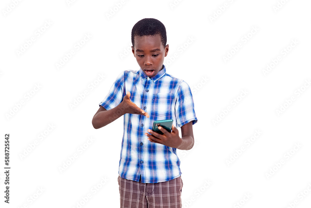 portrait of a young boy communicating on the cell phone unhappy. portrait of a young boy communicating on the cell phone unhappy.