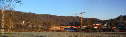Construction site of a temporary bridge after Prüm river flood in Minden village, Eifel region in Germany