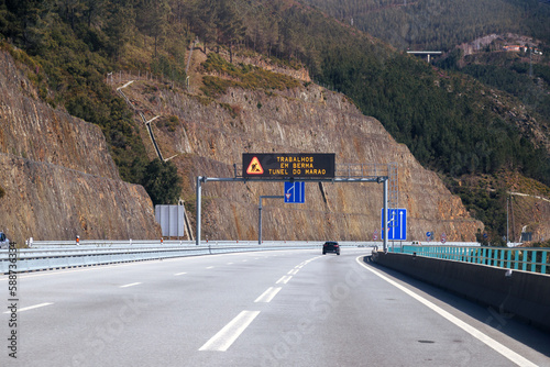 A4 motorway, before entering the Marao tunnel, Amarente - Vila Real, Portugal. Luminous signage board. 