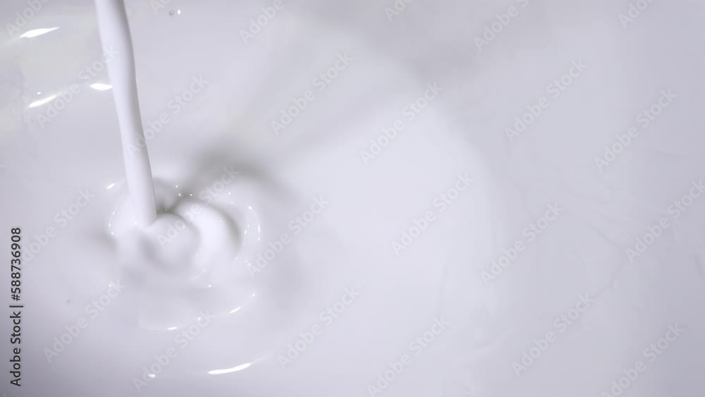 pouring coconut milk, slow motion shot pouring coconut milk, slow motion shot