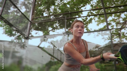 People play tennis outdoor court slow motion. Young adult player serve ball opponent. Racket sport game match. Athlete girl hit workout outside arena. Sportsman health care. Woman person fit exercise.