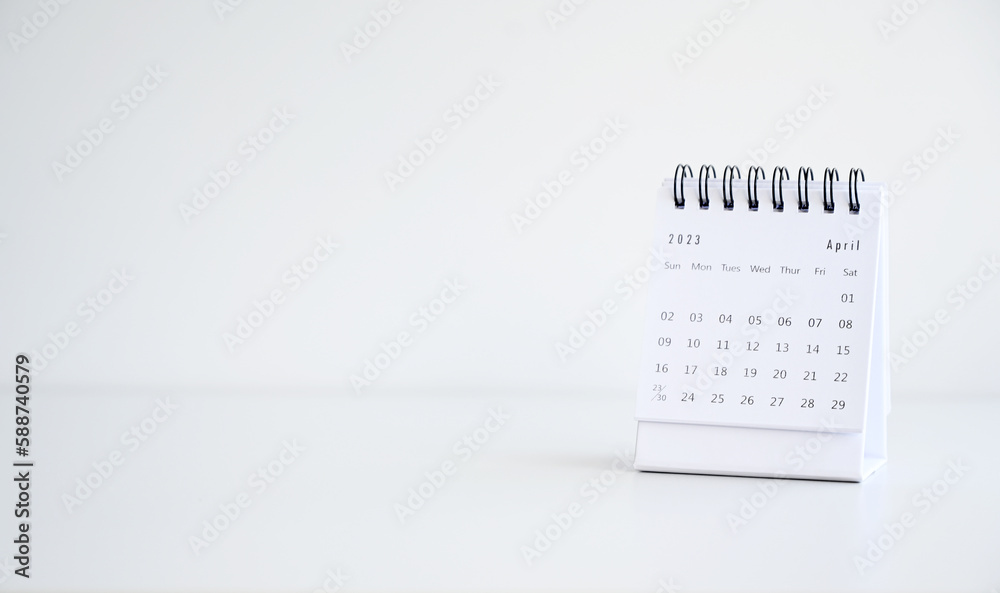 April Calendar 2023 on White table background.Time planning, day counting and holidays April Calendar 2023 on White table background.Time planning, day counting and holidays