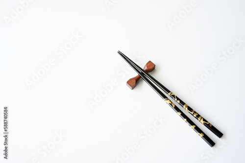black Wooden chopsticks isolated on white