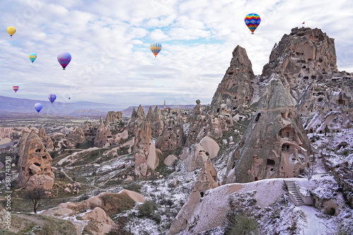 Hot air balloon flying over spectacular Cappadocia, Uchisar - Goreme, Turkey 