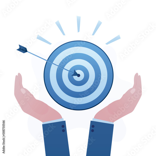 Businessman hands hold target with arrow hit bullseye. Goal or target, focus and concentration to achieve success, motivation and ambitions