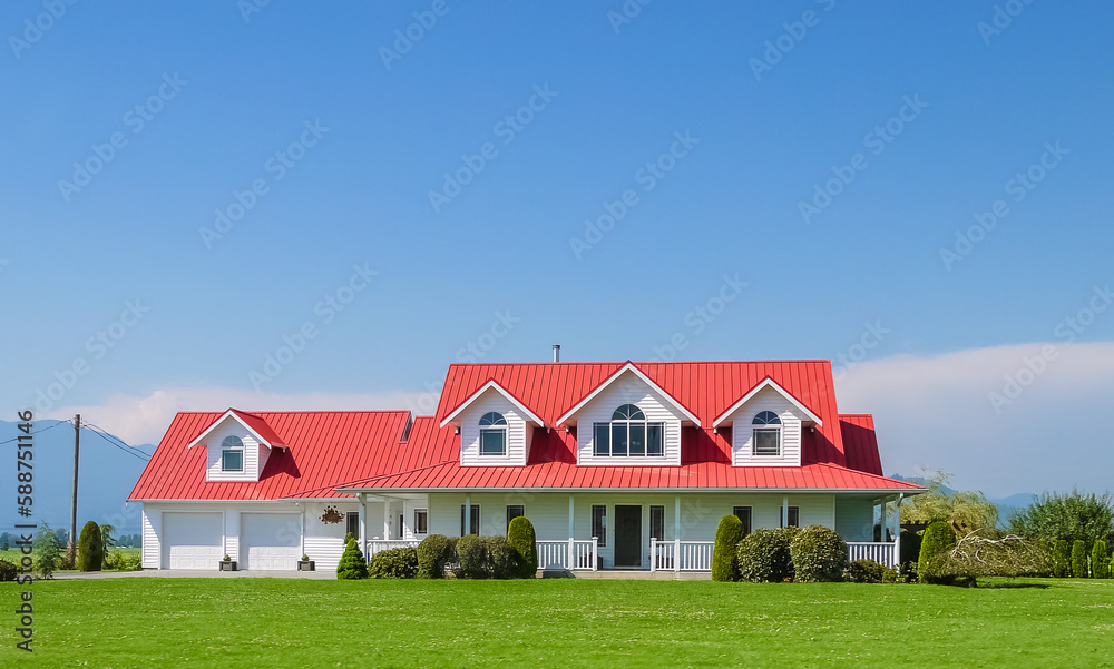 Farmer's family house with double garage green lawn in front