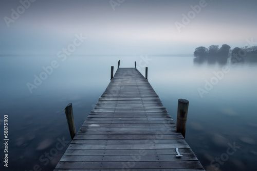 Serene Jetty on a Quiet Body of Water