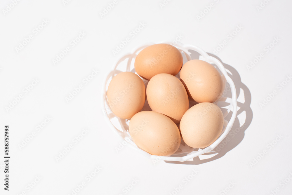 Eggs in bowl on white background, Easter eggs. Protein food Eggs in bowl on white background, Easter eggs. Protein food