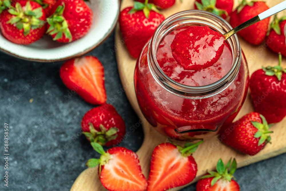 Jar of strawberry jam on white background. Homemade strawberry marmelade and fruits. Long banner format Jar of strawberry jam on white background. Homemade strawberry marmelade and fruits. Long banner format