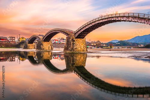 Iwakuni, Yamaguchi, Japan at Kintaikyo Bridge over the Nishiki River photo