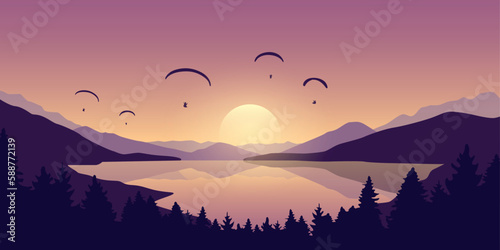 paragliding adventure flying with friends by the lake on mountain background at sunset