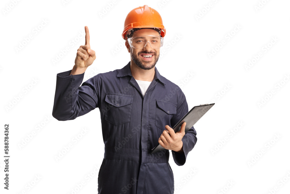 Factory worker wearing a protective helmet and goggles and pointing up Factory worker wearing a protective helmet and goggles and pointing up