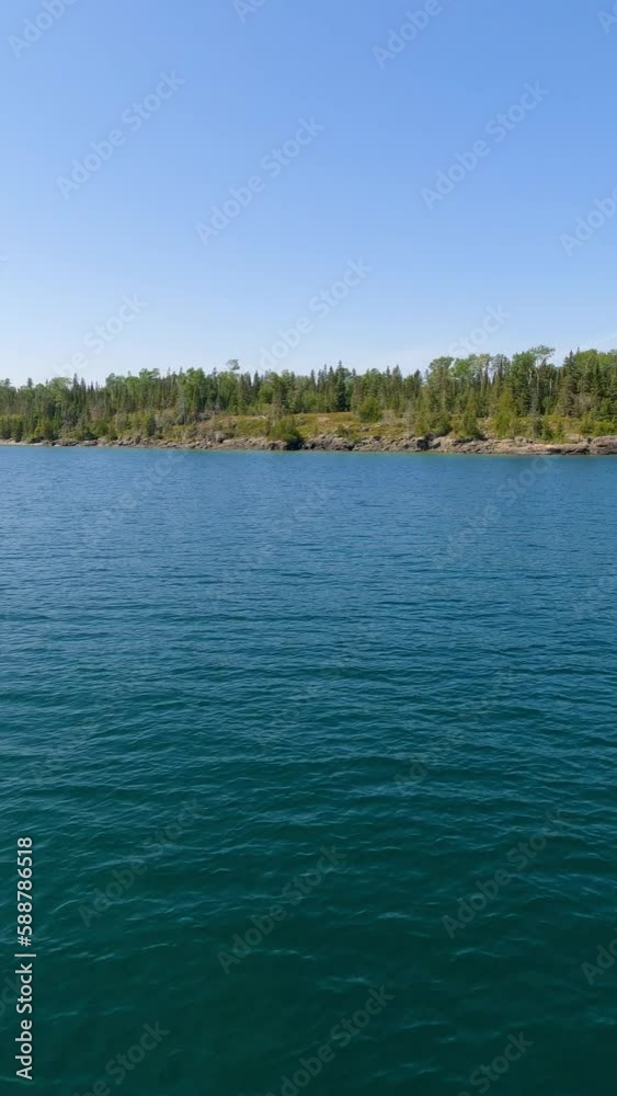 Ferry Boat Leaving the Coast of Rock Harbor at Isle Royale National Park Ferry Boat Leaving the Coast of Rock Harbor at Isle Royale National Park