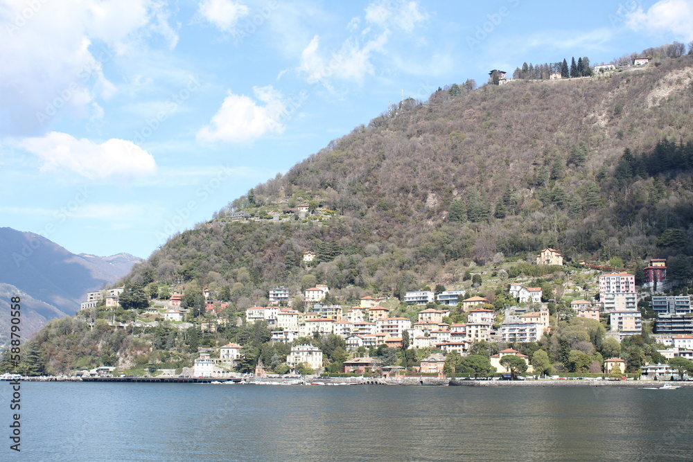 Panoramic photography of villages by lake Como.