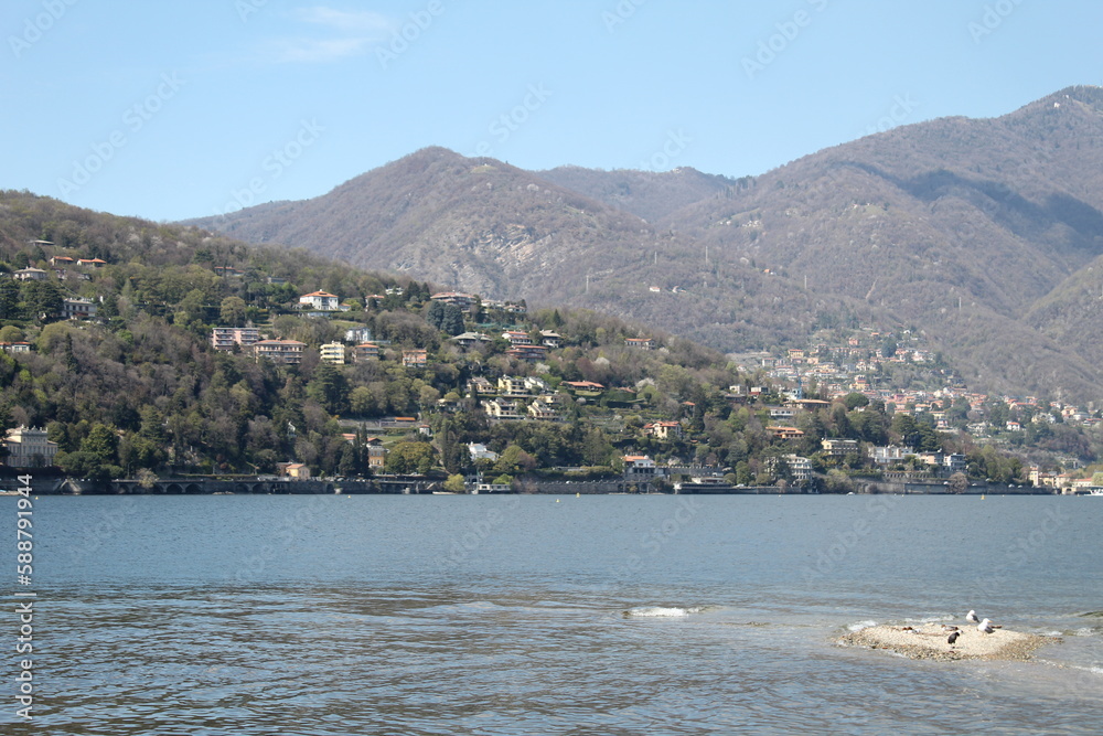 Panoramic photography of villages by lake Como.