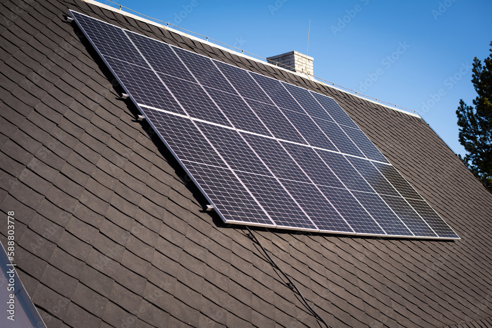 Solar panels on the roof of a private country house Solar panels on the roof of a private country house