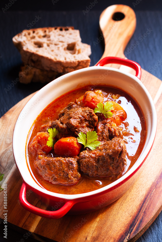 Food concept Homemade Beef stew Goulash on black background with copy space Food concept Homemade Beef stew Goulash on black background with copy space