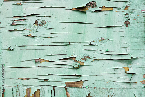 Peeled paint on a wooden wall. peeling paint