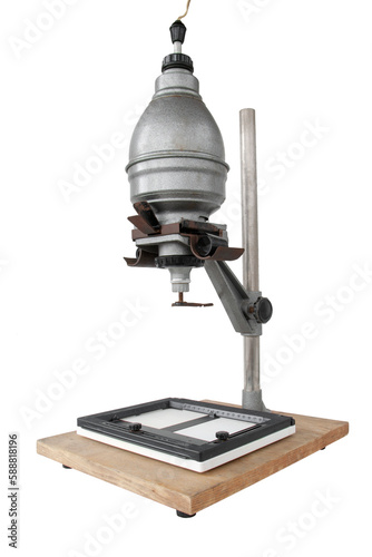Vintage photographic enlarger for projecting photo negatives, isolated on white background, Contains clipping path photo