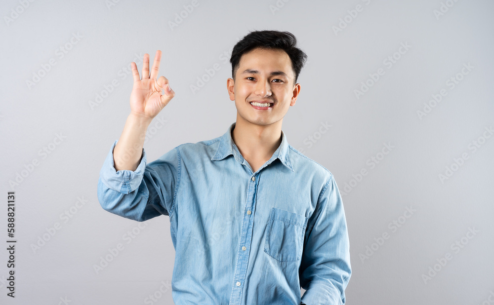 image of young businessman male on gray background image of young businessman male on gray background