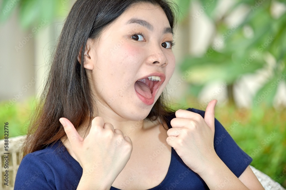 Fototapeta premium A Happy Youthful Chinese Person