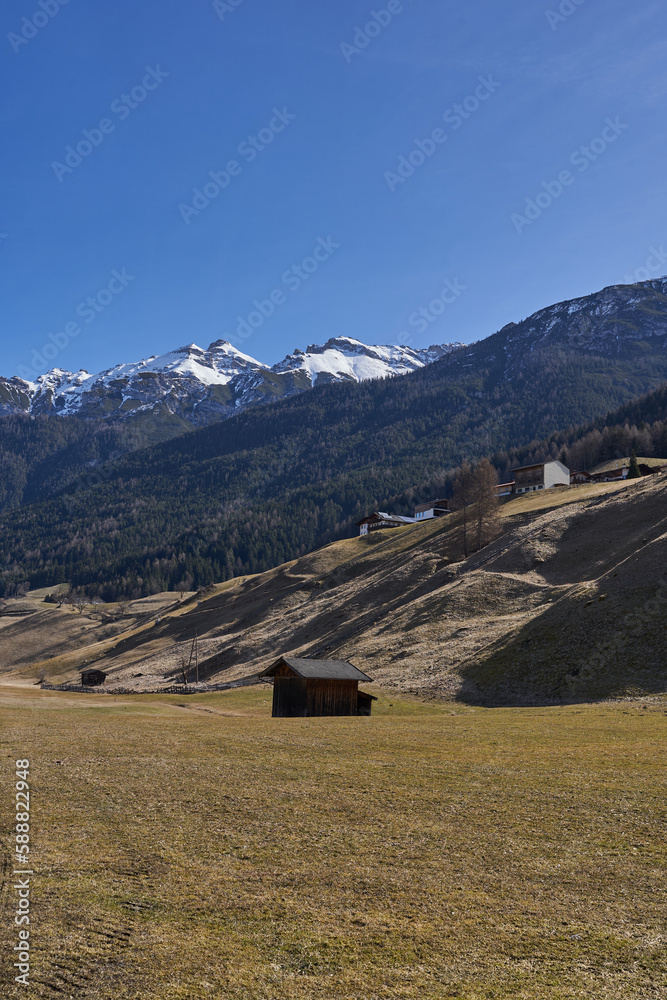 Neustift im Stubaital, Austria - March 16, 2023 - beautiful meadows and hillsides near Neustift at the end of the winter season   