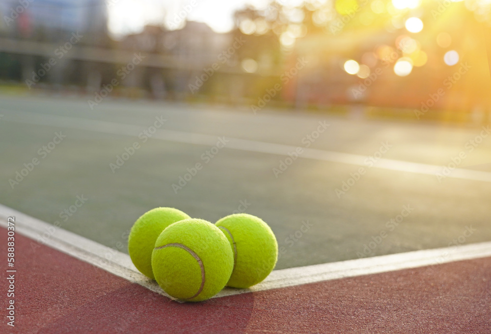  tennis balls on the court  