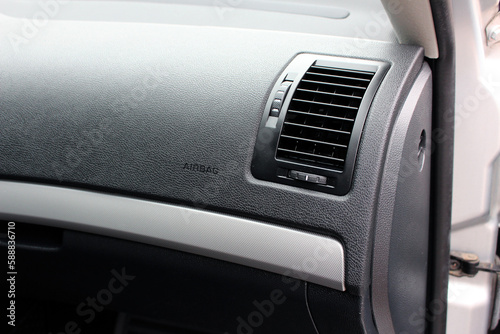 Modern car interior, passenger glovebox and airbag. Glove compartment box in car.