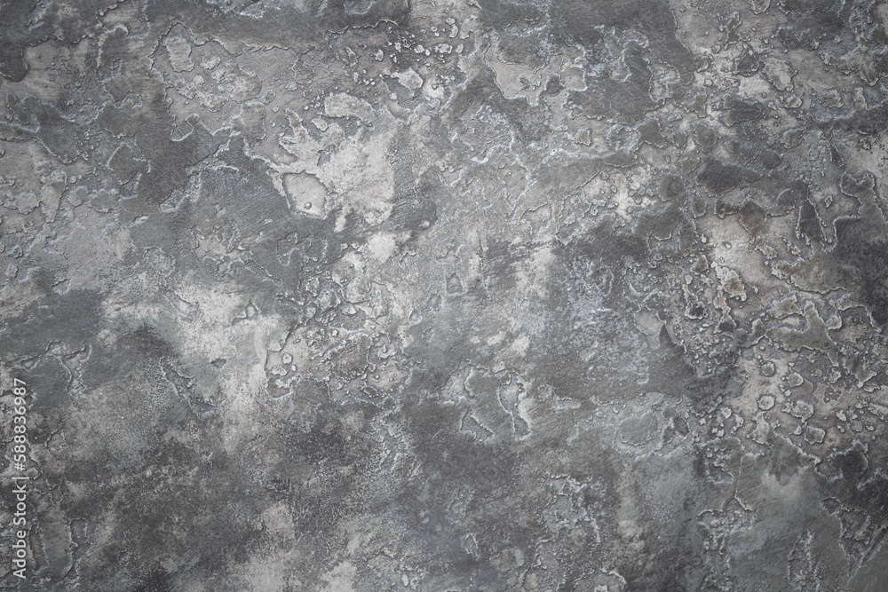 Gray background of decorative plaster with abstract spots. Unusual silver wall texture with beautiful patterns, creative surface background. Dressing coating for building cladding. Gray background of decorative plaster with abstract spots. Unusual silver wall texture with beautiful patterns, creative surface background. Dressing coating for building cladding.
