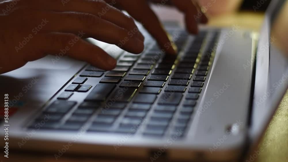 Hands typing on laptop close up horizontal