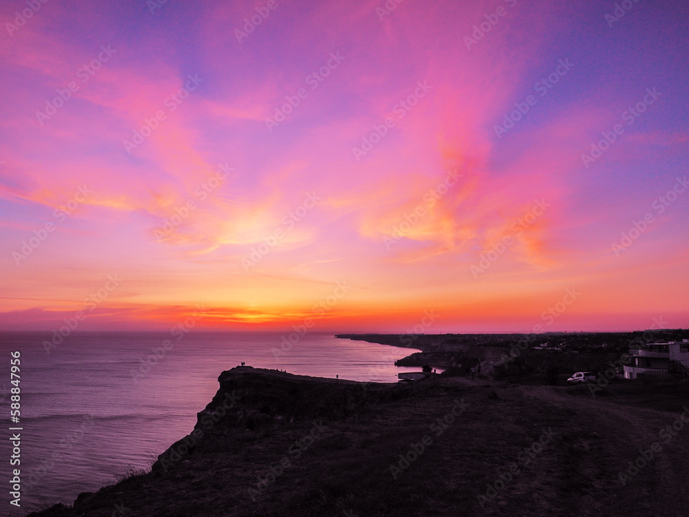 Beautiful colorful sunset at the montains at the sea