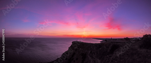 Beautiful colorful sunset at the montains at the sea