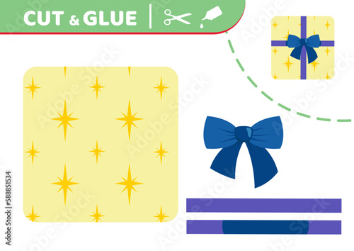 Yellow present with bow. Cut and glue. Application work. Paper game. Vector