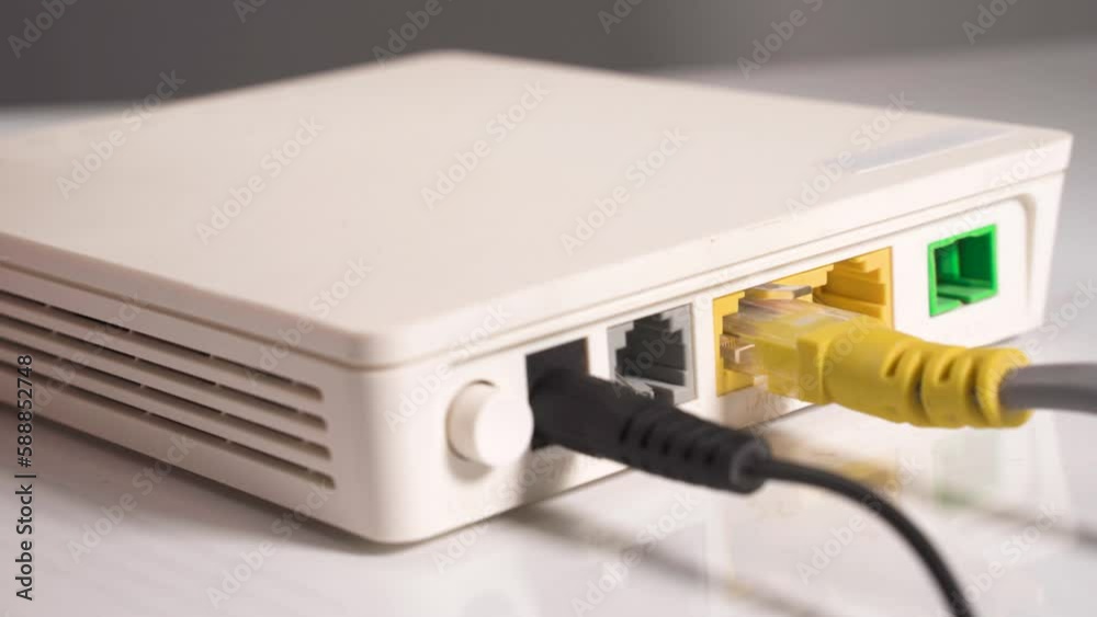 Computer network cable inserts in lAN router port Computer network cable inserts in lAN router port